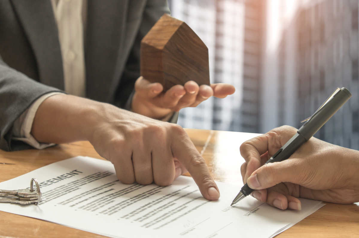 Real estate trading concepts,Home brokers and buyers signing a sale contract.